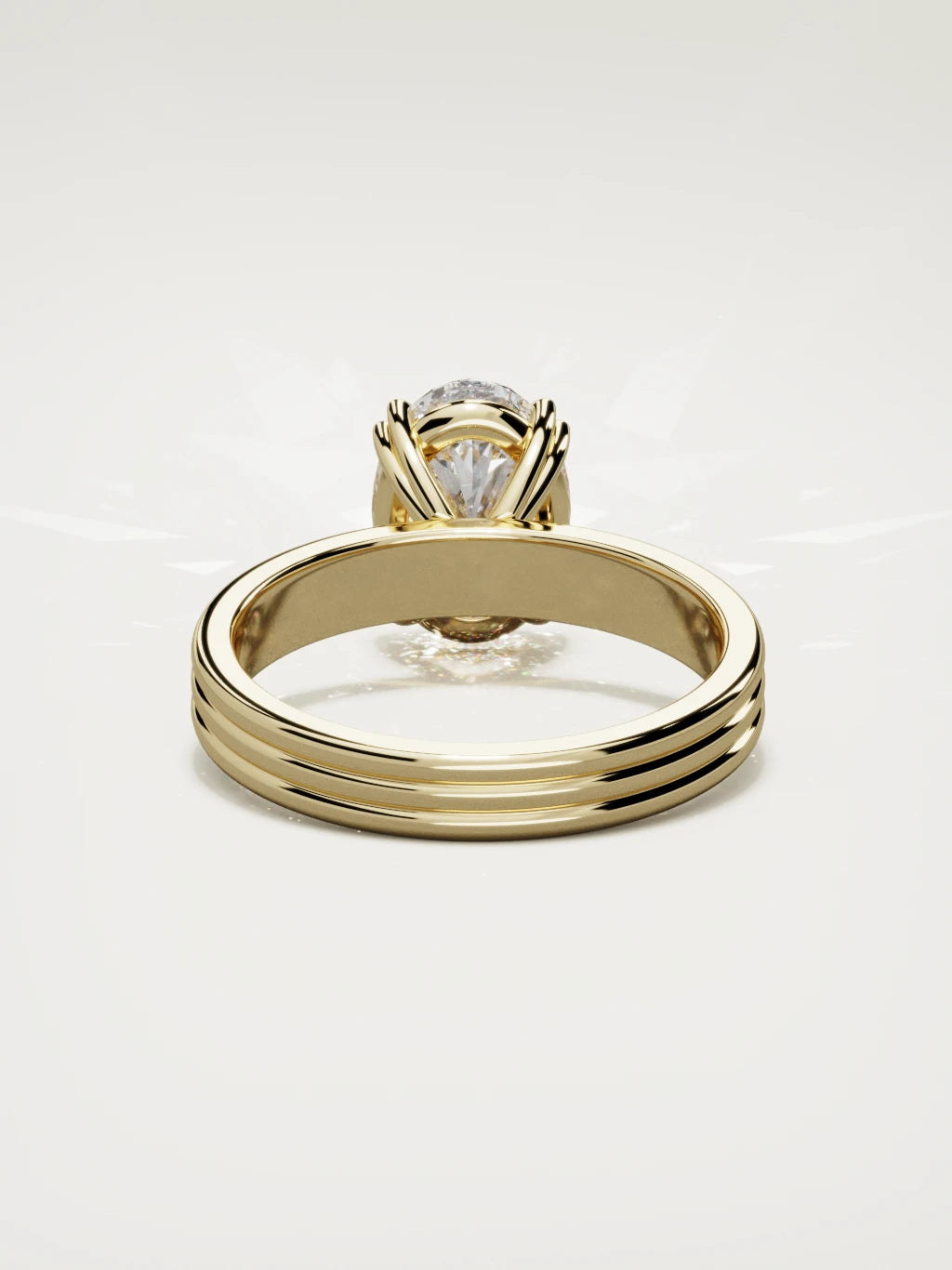 The Lira oval lab-grown diamond solitaire in 14K yellow gold, back view