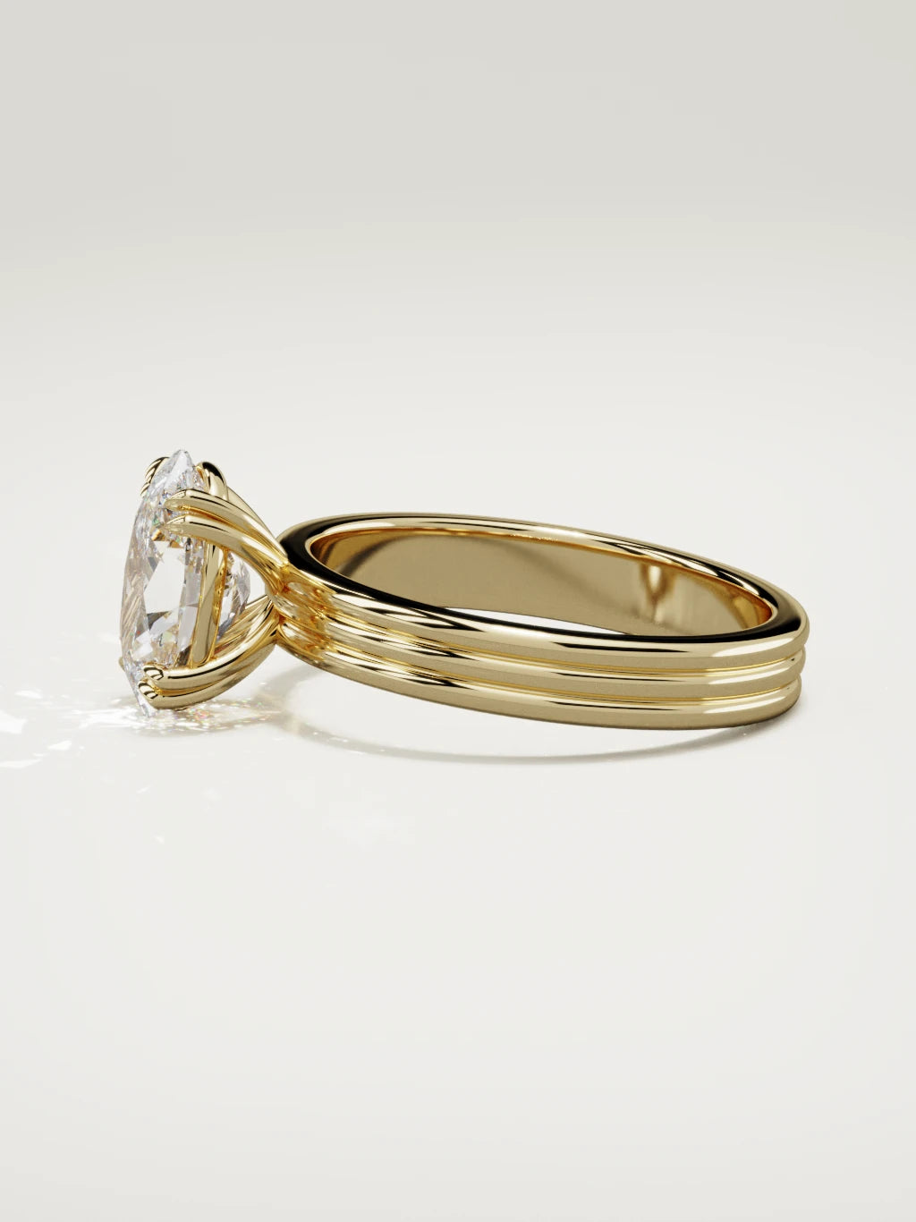 The Lira oval lab-grown diamond solitaire in 14K yellow gold, side view