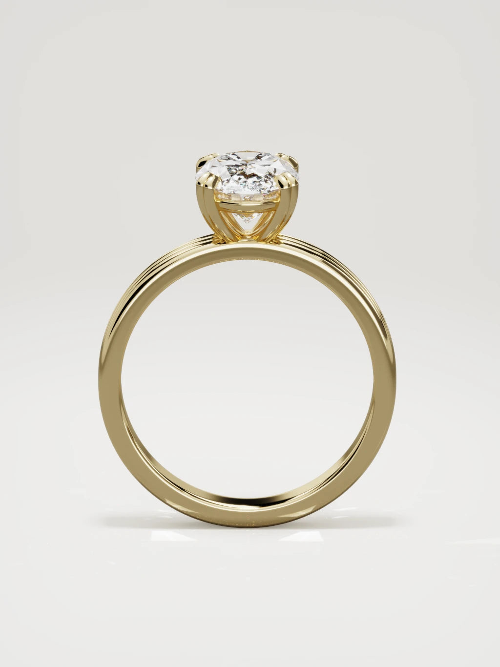 The Lira oval lab-grown diamond solitaire in 14K yellow gold, standing front view
