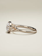 The Luna round lab-grown diamond solitaire in 14K rose gold, side view