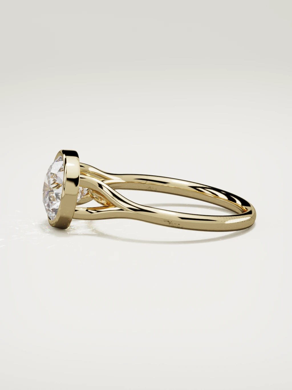 The Luna round lab-grown diamond solitaire in 14K yellow gold, side view