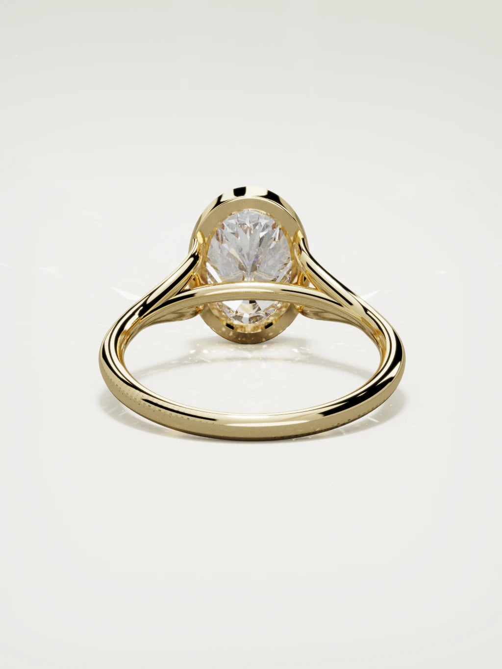 The Luna oval lab-grown diamond solitaire in 14K yellow gold, back view