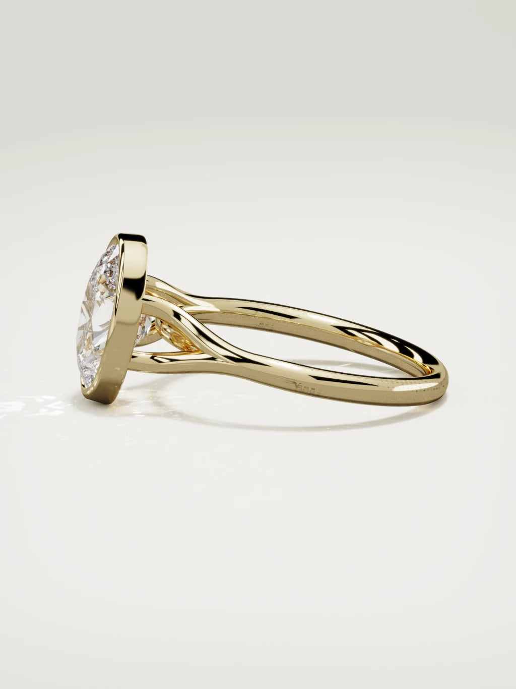 The Luna oval lab-grown diamond solitaire in 14K yellow gold, side view