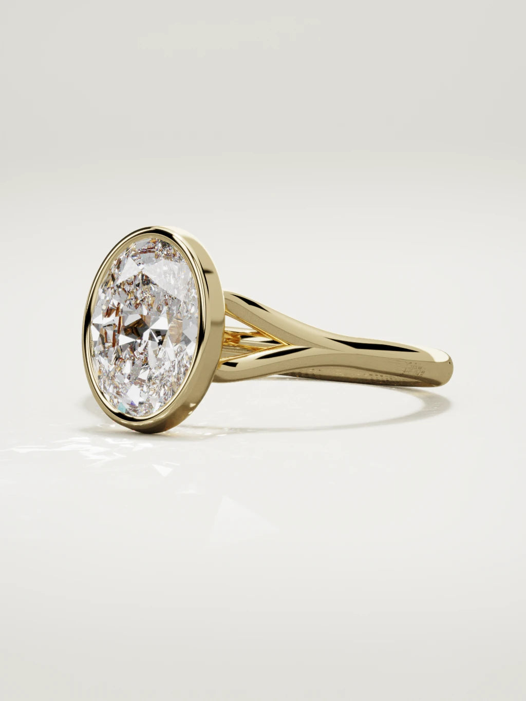 The Luna oval lab-grown diamond solitaire in 14K yellow gold, three-quarter view