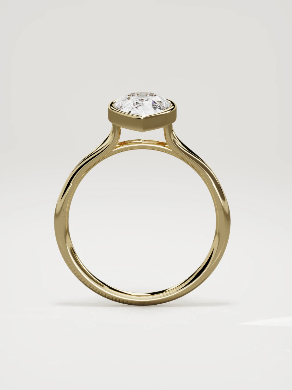 The Luna pear-shaped lab-grown diamond solitaire in 14K yellow gold, standing front view