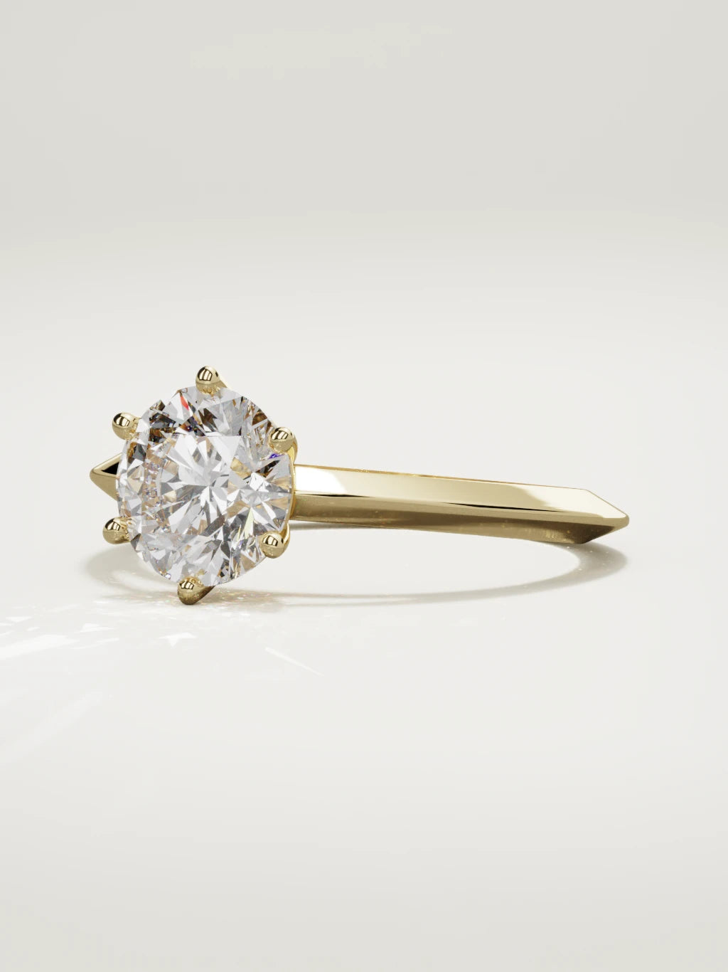 The Nave round lab-grown diamond solitaire in 14K yellow gold, three-quarter view