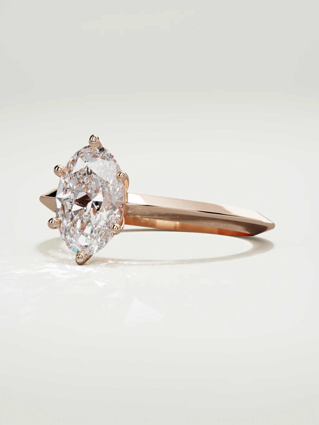 The Nave oval lab-grown diamond solitaire in 14K rose gold, three-quarter view
