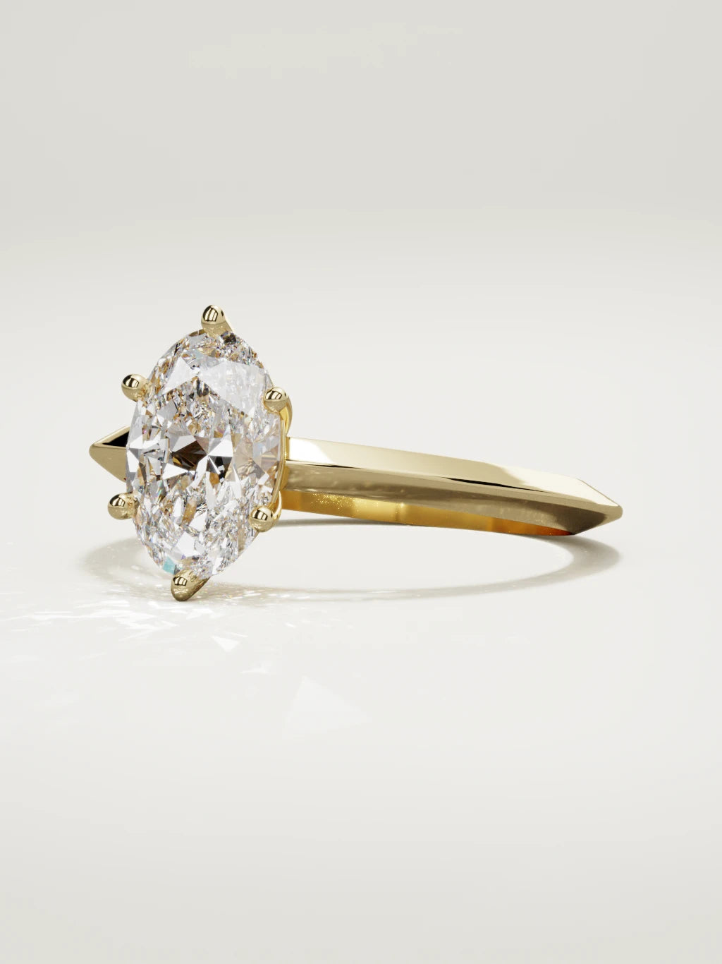 The Nave oval lab-grown diamond solitaire in 14K yellow gold, three-quarter view