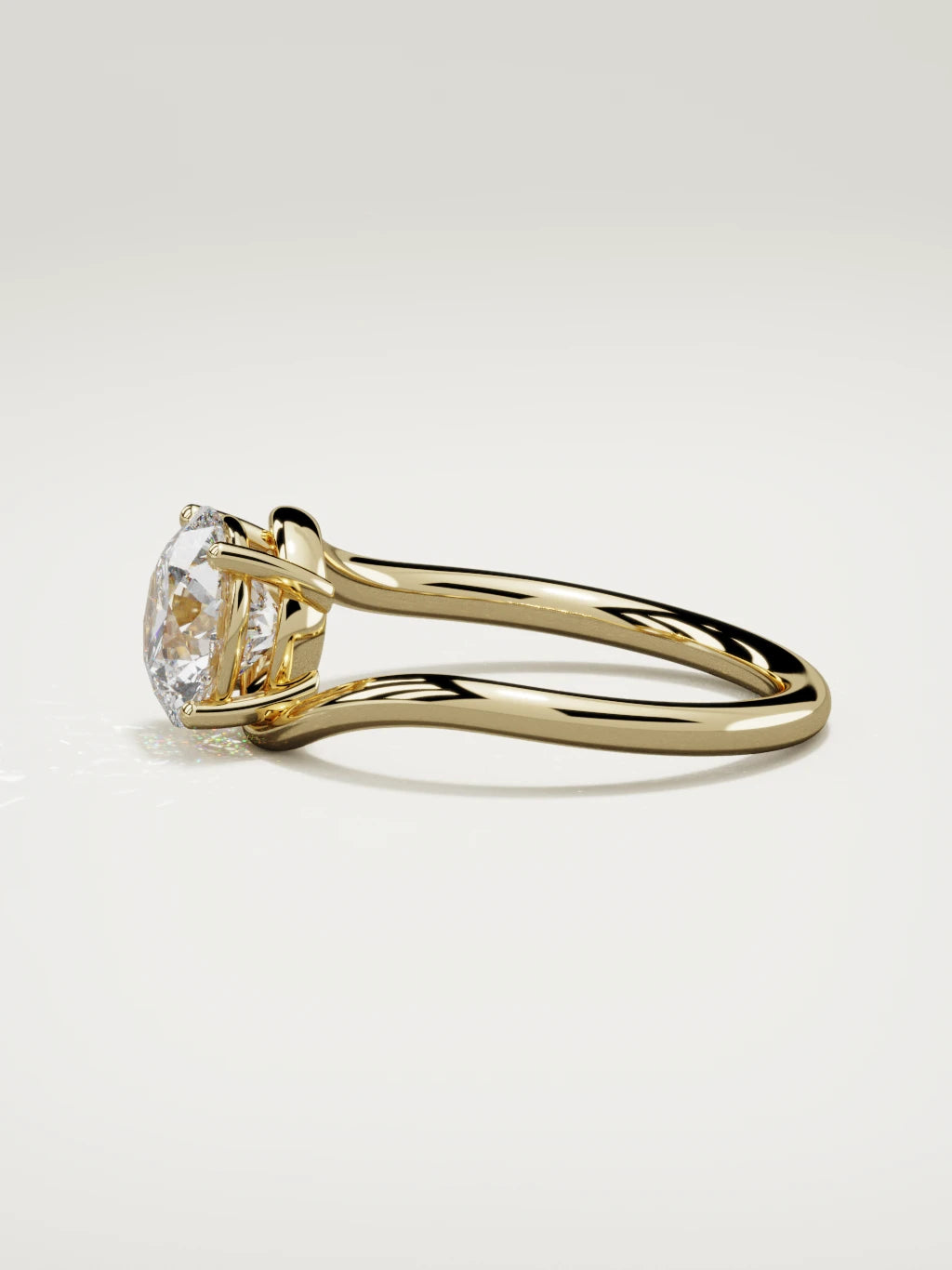 The Ola round lab-grown diamond solitaire in 14K yellow gold, side view