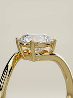 The Ola round lab-grown diamond solitaire in 14K yellow gold, standing three-quarter view