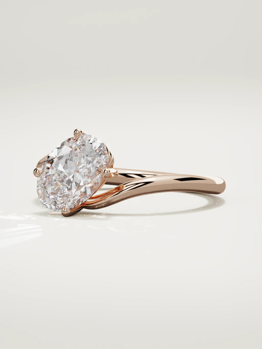The Ola east-west oval lab-grown diamond solitaire in 14K rose gold, three-quarter view