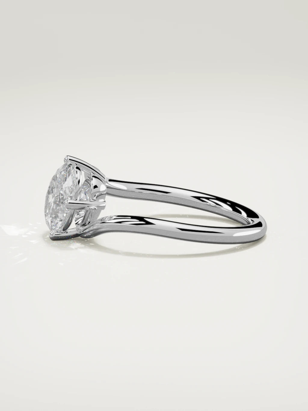 The Ola east-west oval lab-grown diamond solitaire in 14K white gold, side view