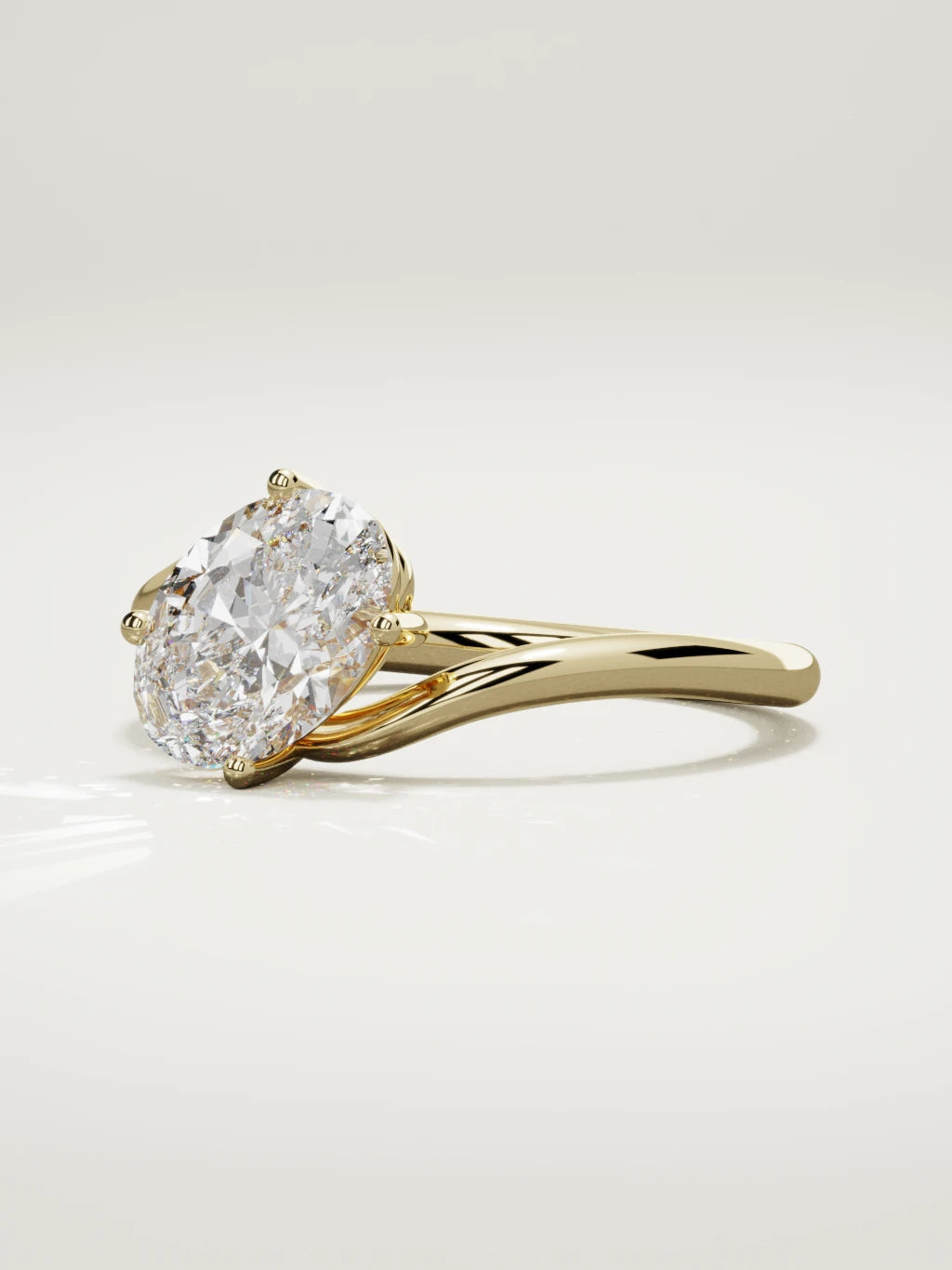 The Ola east-west oval lab-grown diamond solitaire in 14K yellow gold, three-quarter view