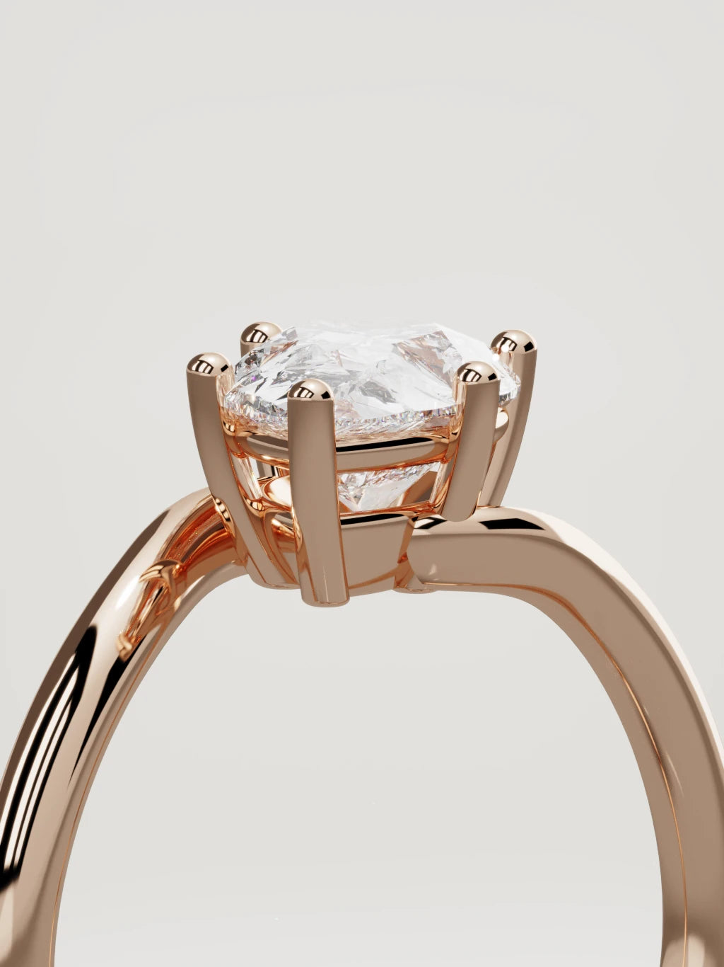 The Ola east-west pear-shaped lab-grown diamond solitaire in 14K rose gold, standing three-quarter view