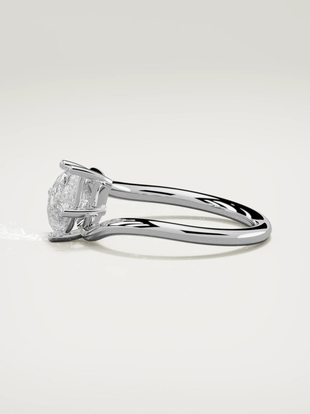 The Ola east-west pear-shaped lab-grown diamond solitaire in 14K white gold, side view