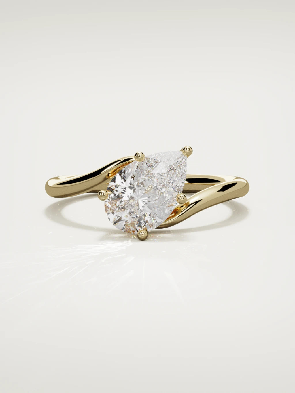 The Ola east-west pear-shaped lab-grown diamond solitaire in 14K yellow gold, front view