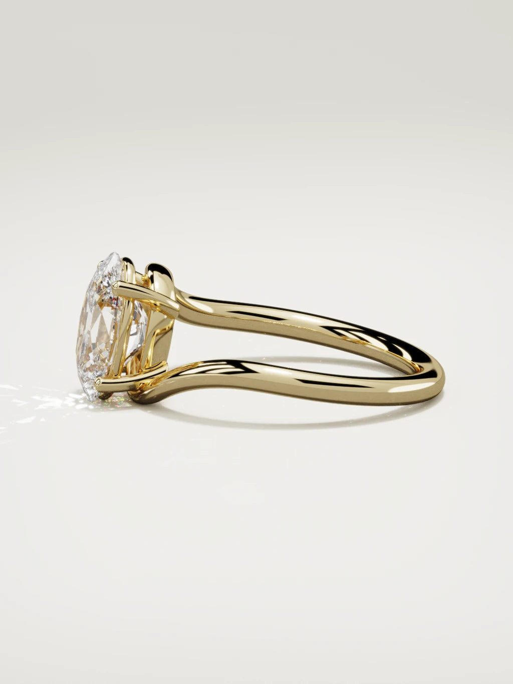The Ola oval lab-grown diamond solitaire in 14K yellow gold, side view