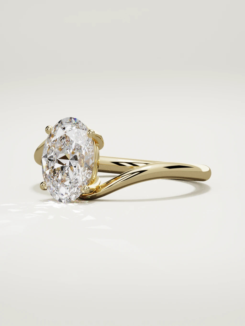 The Ola oval lab-grown diamond solitaire in 14K yellow gold, three-quarter view