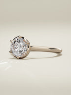 The Orbe round lab-grown diamond solitaire in 14K rose gold, three-quarter view