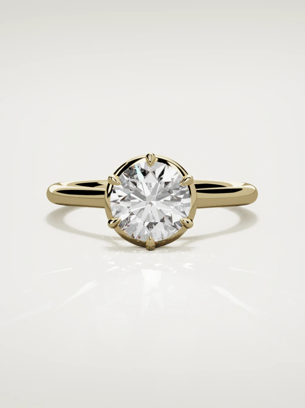 The Orbe round lab-grown diamond solitaire in 14K yellow gold, front view