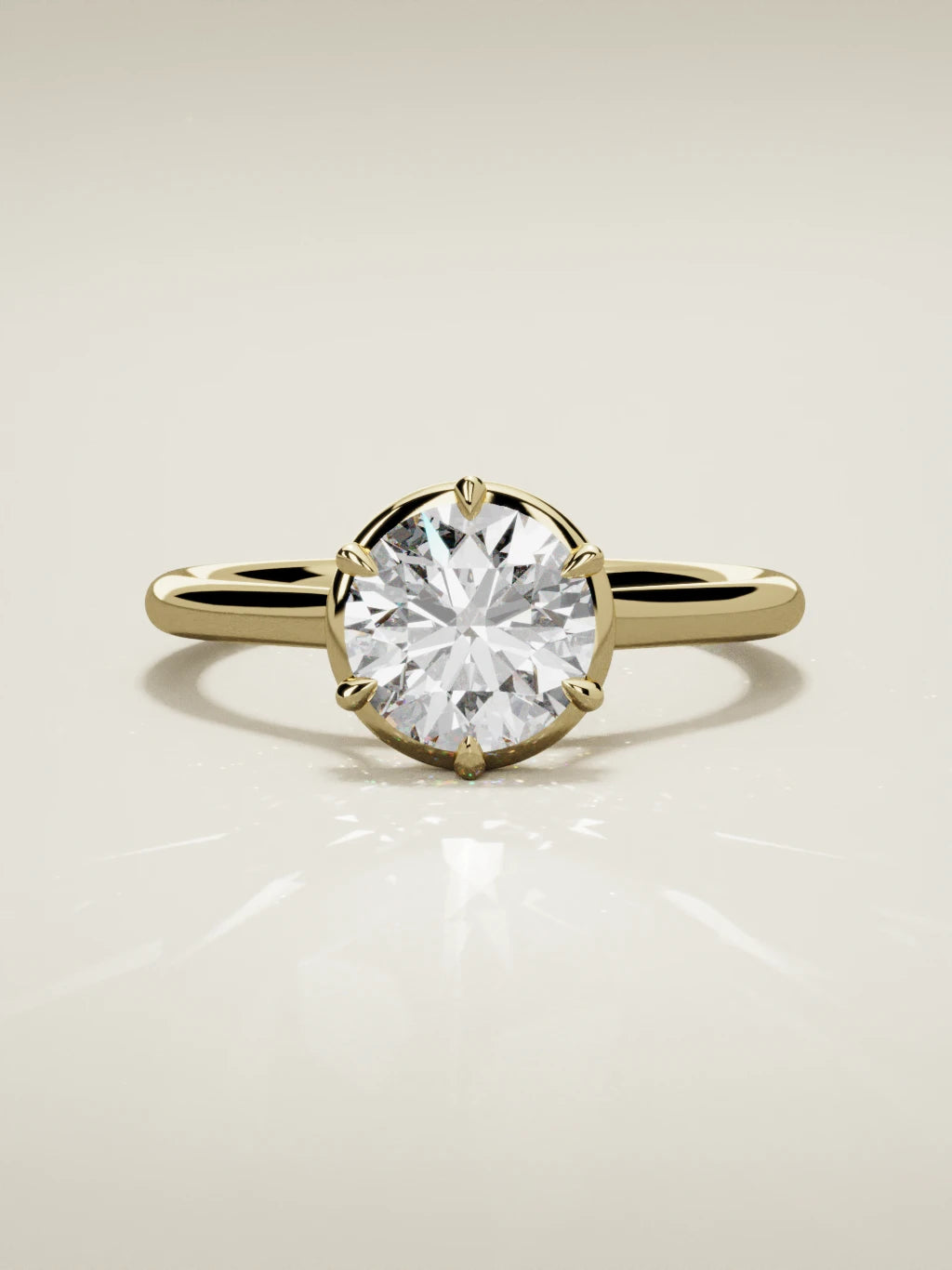 The Orbe round lab-grown diamond solitaire in 14K yellow gold, front view