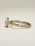 The Orbe round lab-grown diamond solitaire in 14K yellow gold, side view