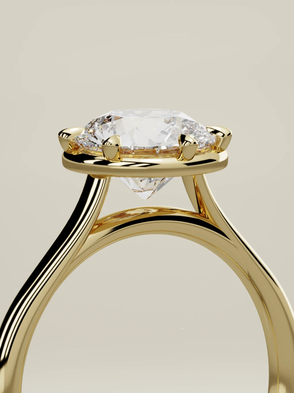 The Orbe round lab-grown diamond solitaire in 14K yellow gold, standing three-quarter view