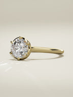 The Orbe round lab-grown diamond solitaire in 14K yellow gold, three-quarter view