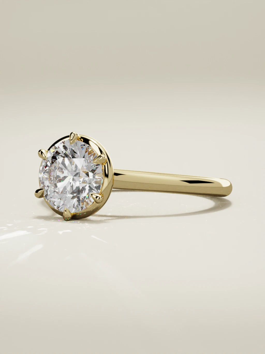 The Orbe round lab-grown diamond solitaire in 14K yellow gold, three-quarter view