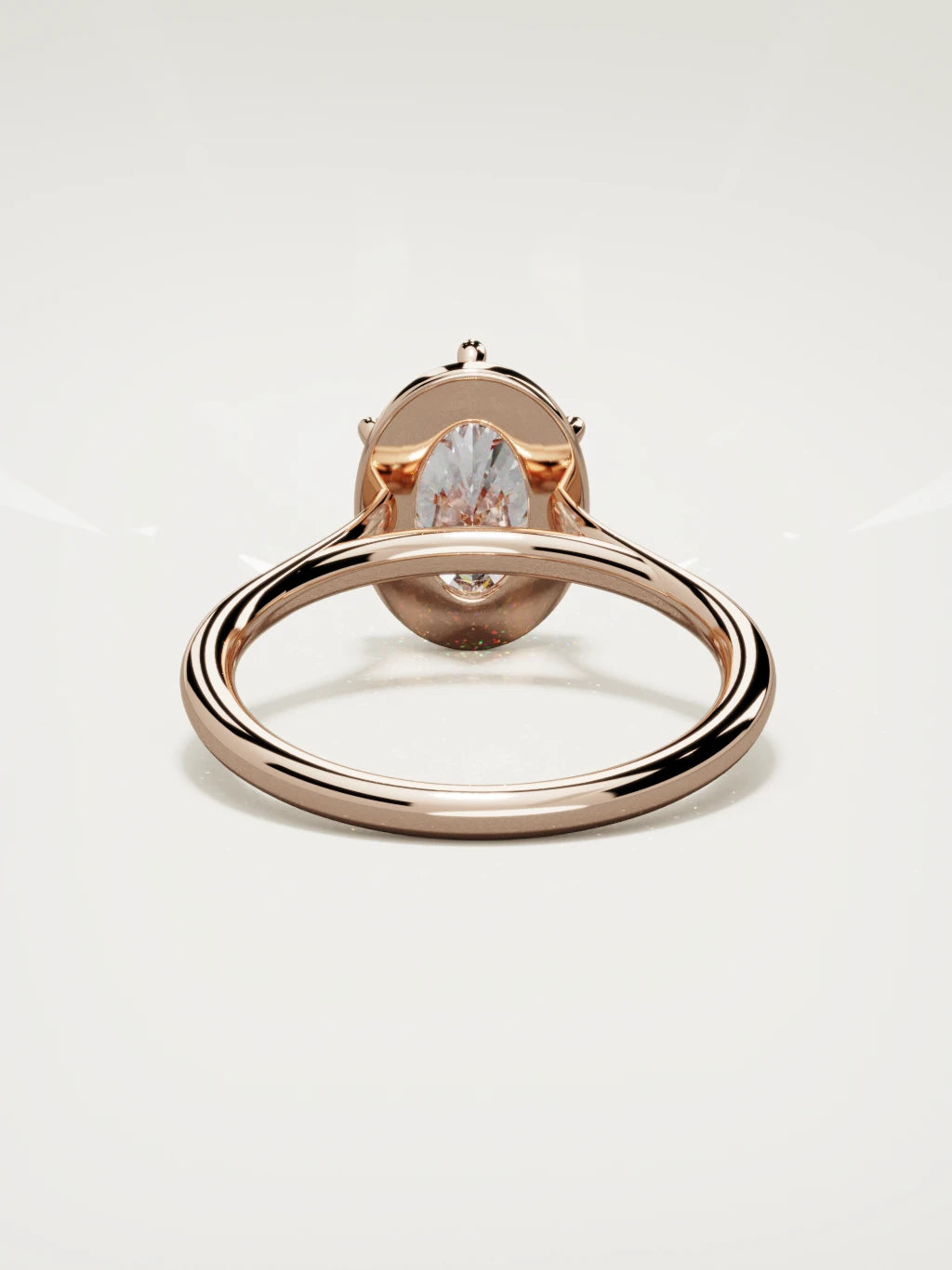 The Orbe oval lab-grown diamond solitaire in 14K rose gold, back view