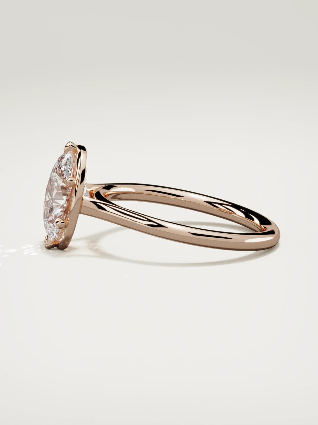 The Orbe oval lab-grown diamond solitaire in 14K rose gold, side view