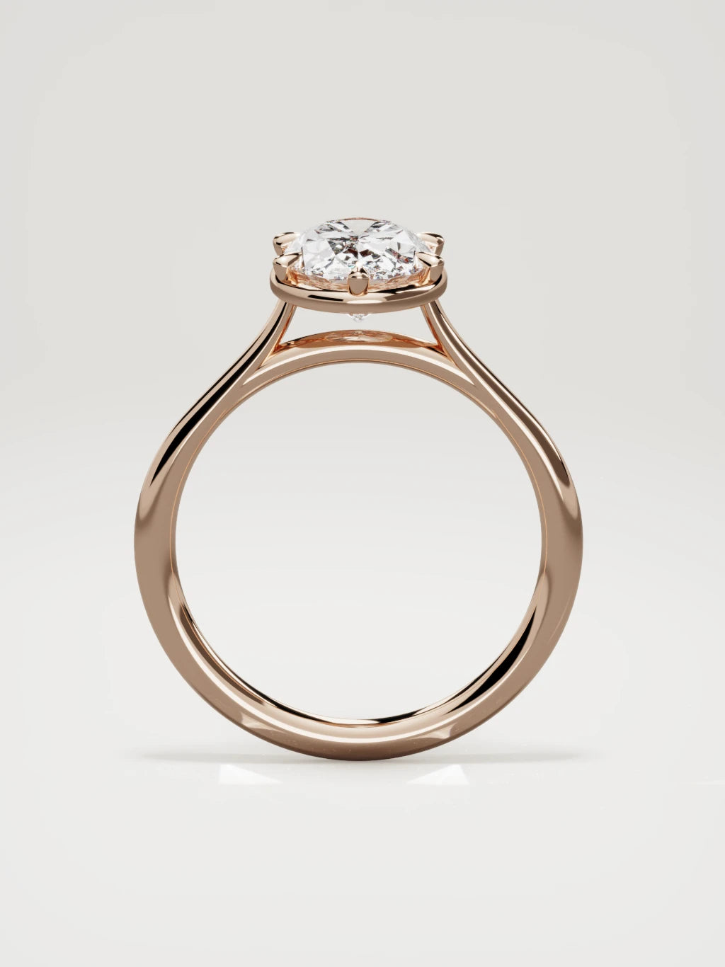 The Orbe oval lab-grown diamond solitaire in 14K rose gold, standing front view