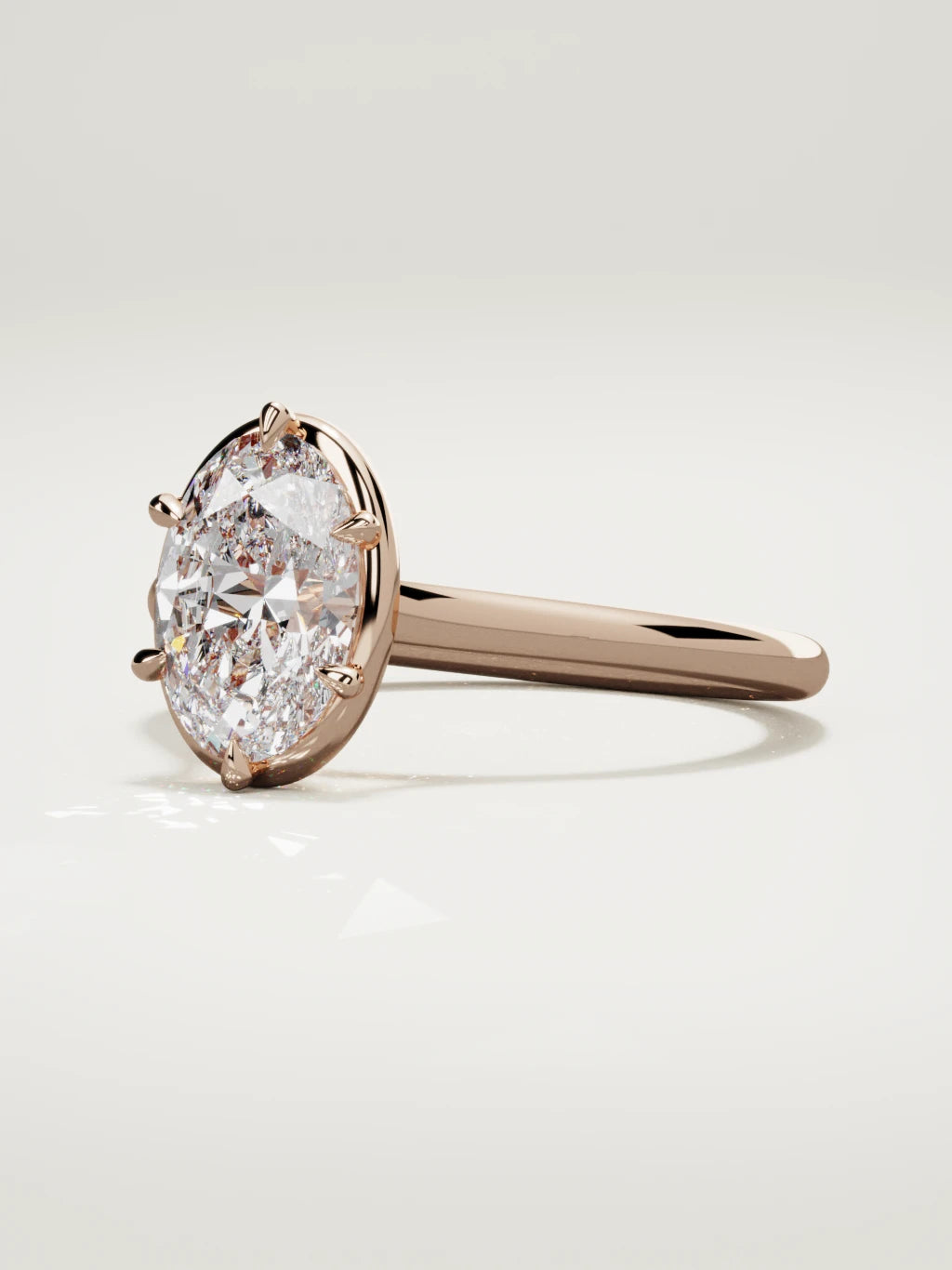The Orbe oval lab-grown diamond solitaire in 14K rose gold, three-quarter view