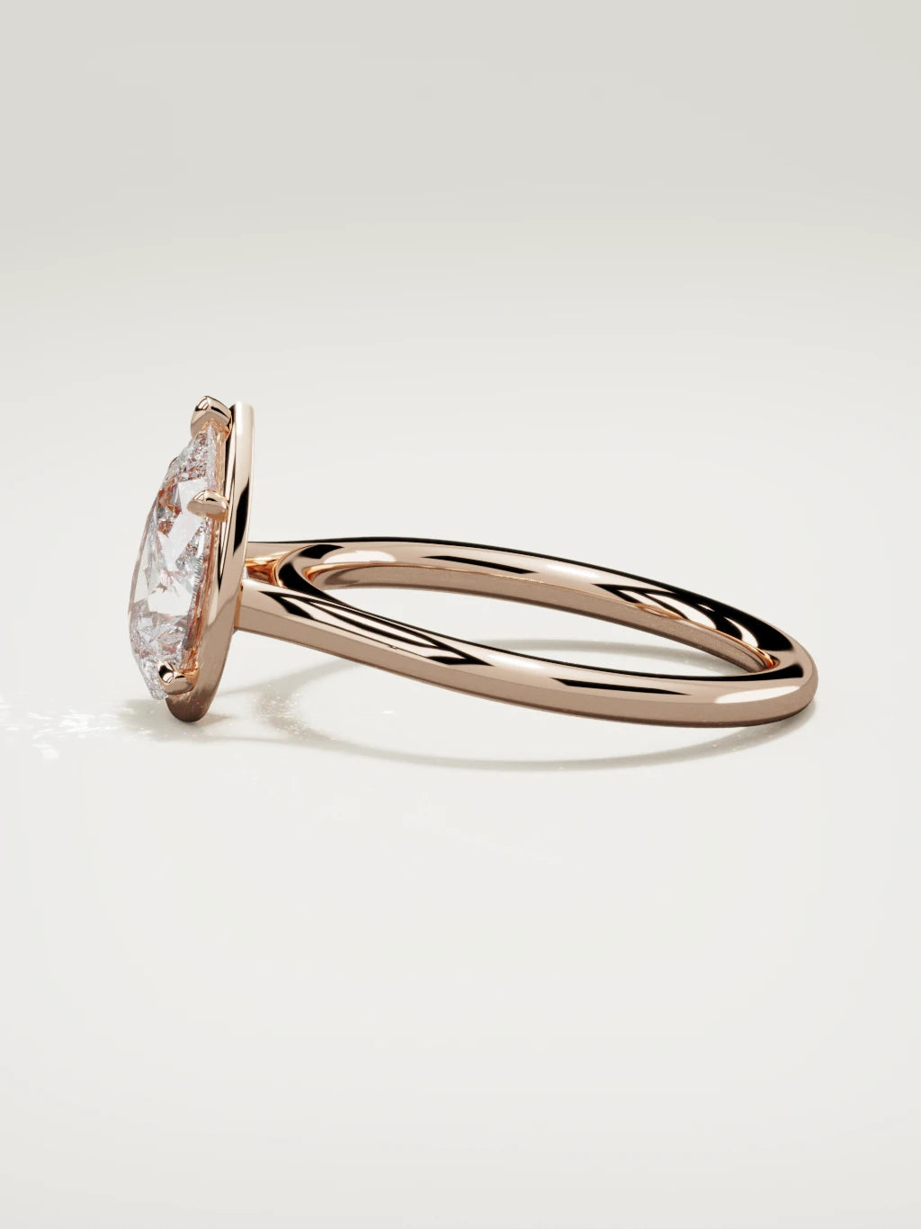 The Orbe pear-shaped lab-grown diamond solitaire in 14K rose gold, side view