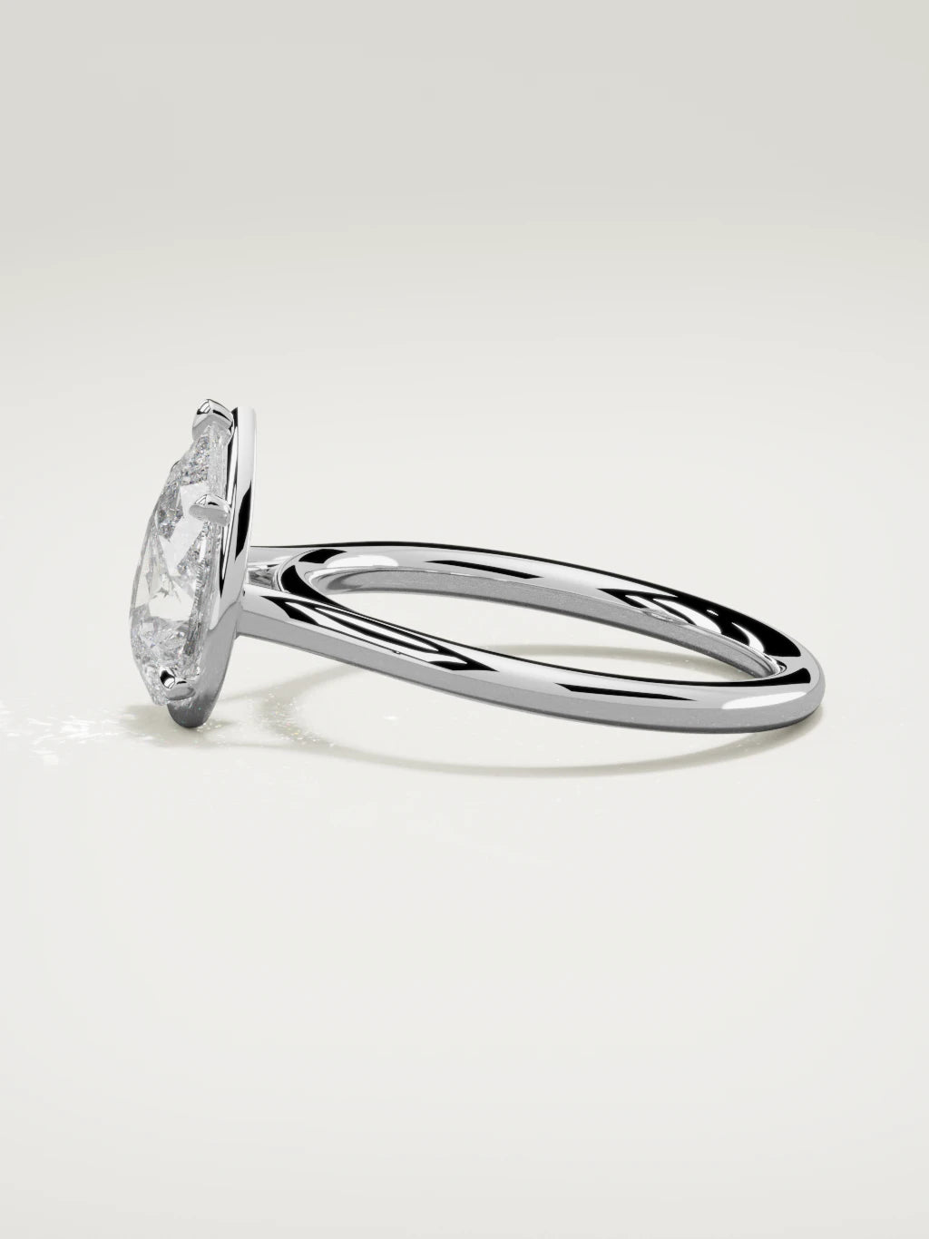 The Orbe pear-shaped lab-grown diamond solitaire in 14K white gold, side view