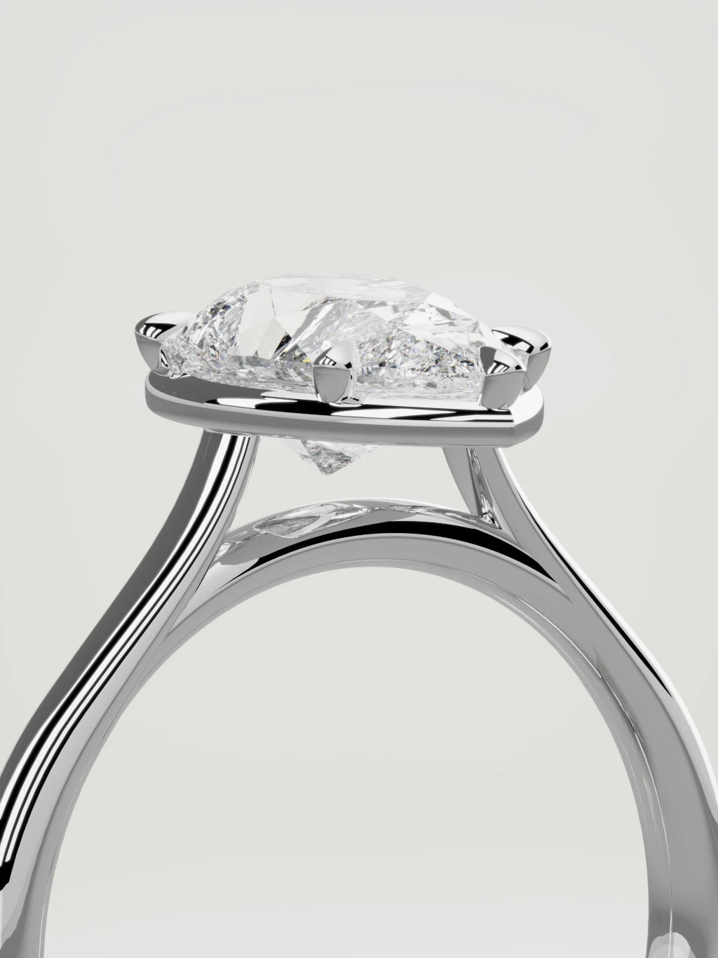 The Orbe pear-shaped lab-grown diamond solitaire in 14K white gold, standing three-quarter view
