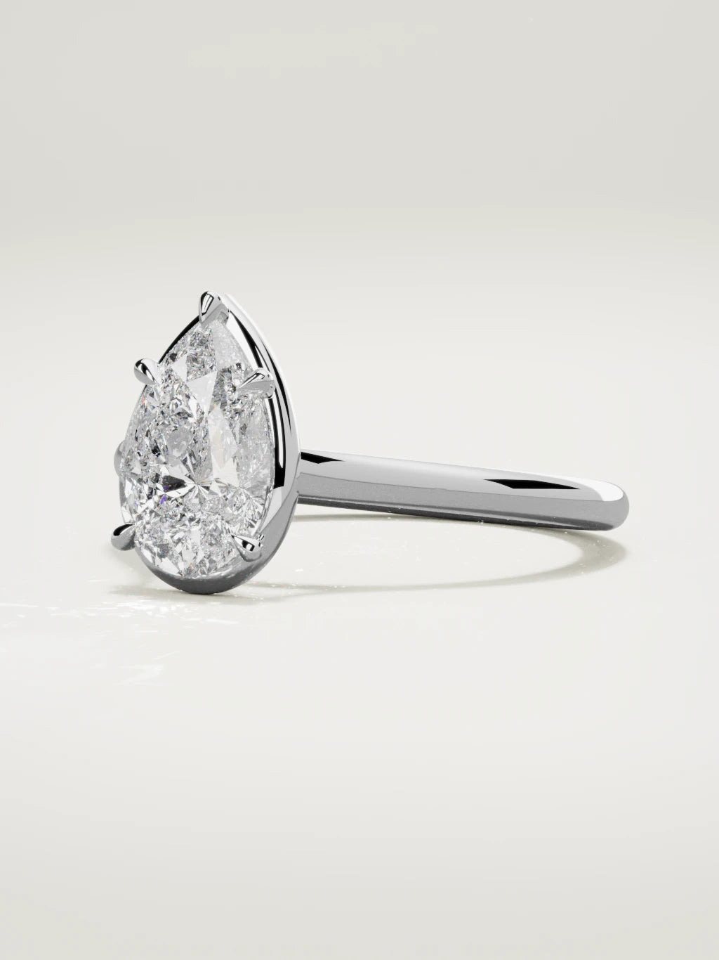 The Orbe pear-shaped lab-grown diamond solitaire in 14K white gold, three-quarter view
