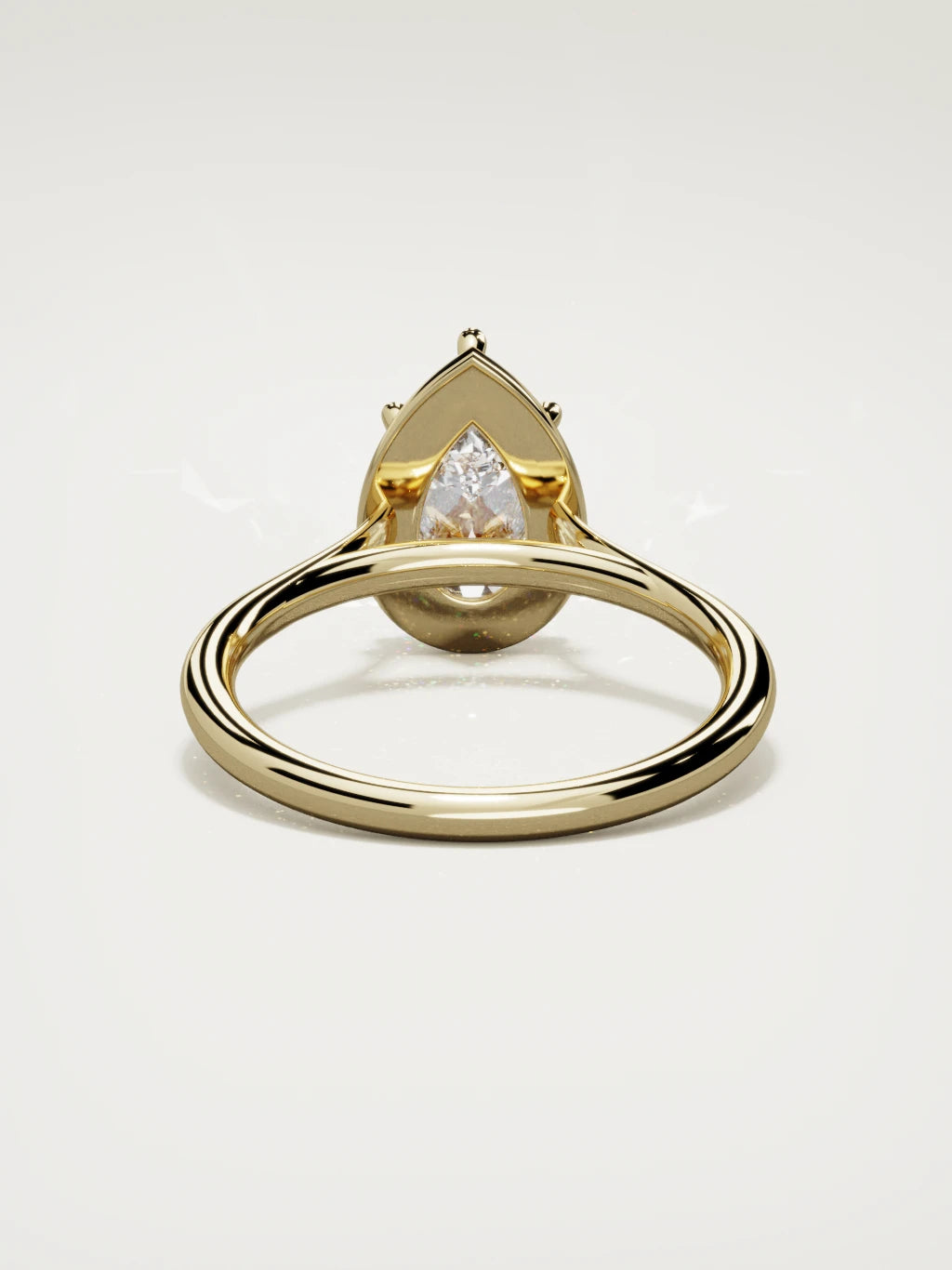 The Orbe pear-shaped lab-grown diamond solitaire in 14K yellow gold, back view