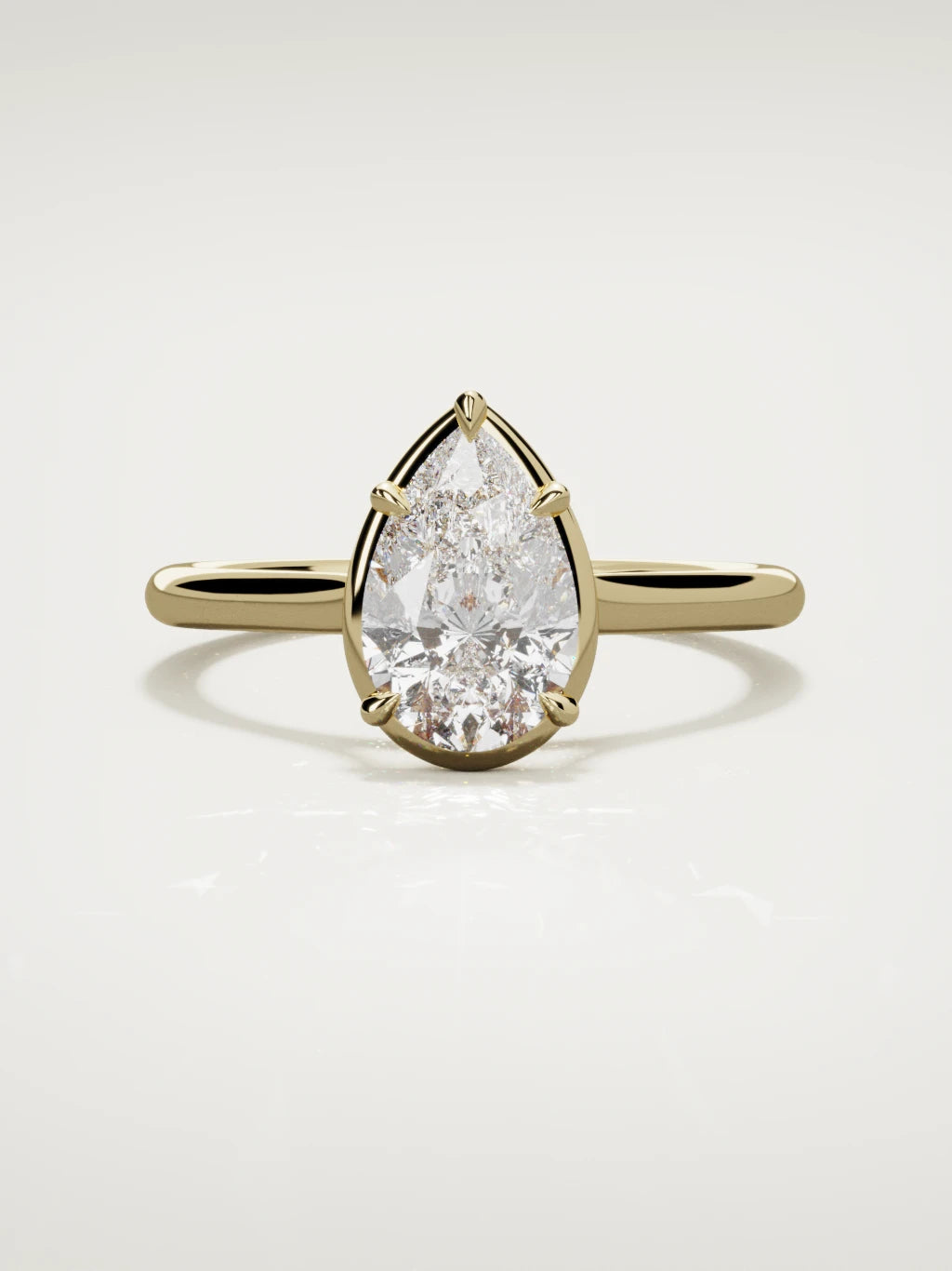The Orbe pear-shaped lab-grown diamond solitaire in 14K yellow gold, front view