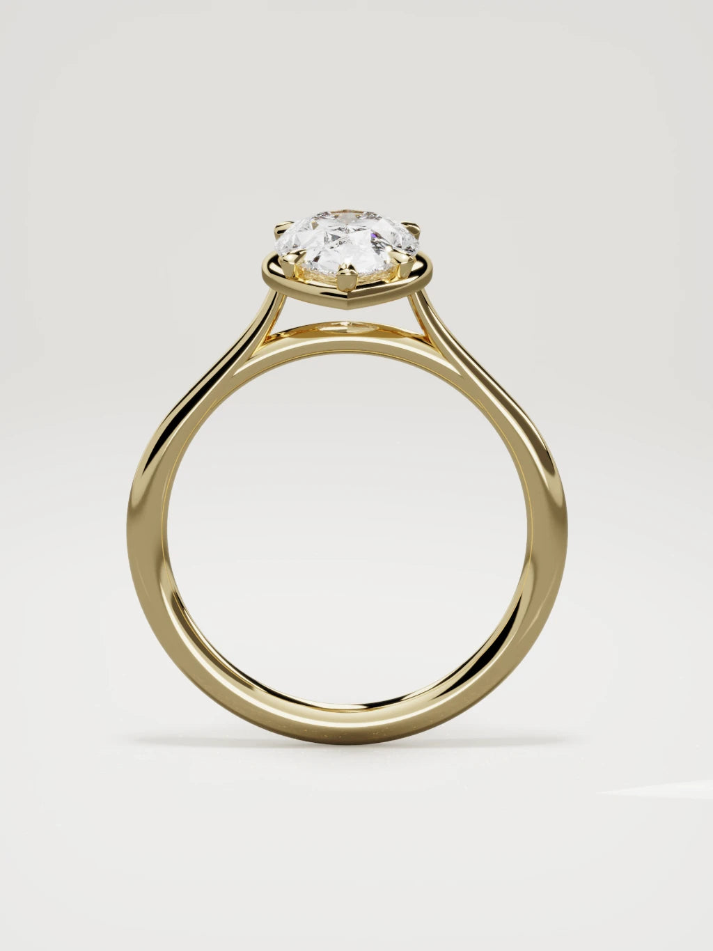 The Orbe pear-shaped lab-grown diamond solitaire in 14K yellow gold, standing front view