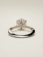 The Prisma round lab-grown diamond solitaire in 14K rose gold, back view