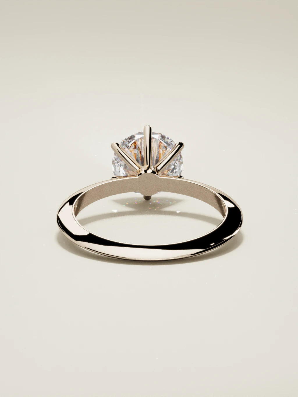 The Prisma round lab-grown diamond solitaire in 14K rose gold, back view