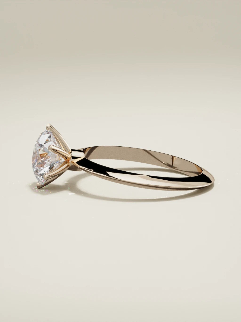 The Prisma round lab-grown diamond solitaire in 14K rose gold, side view