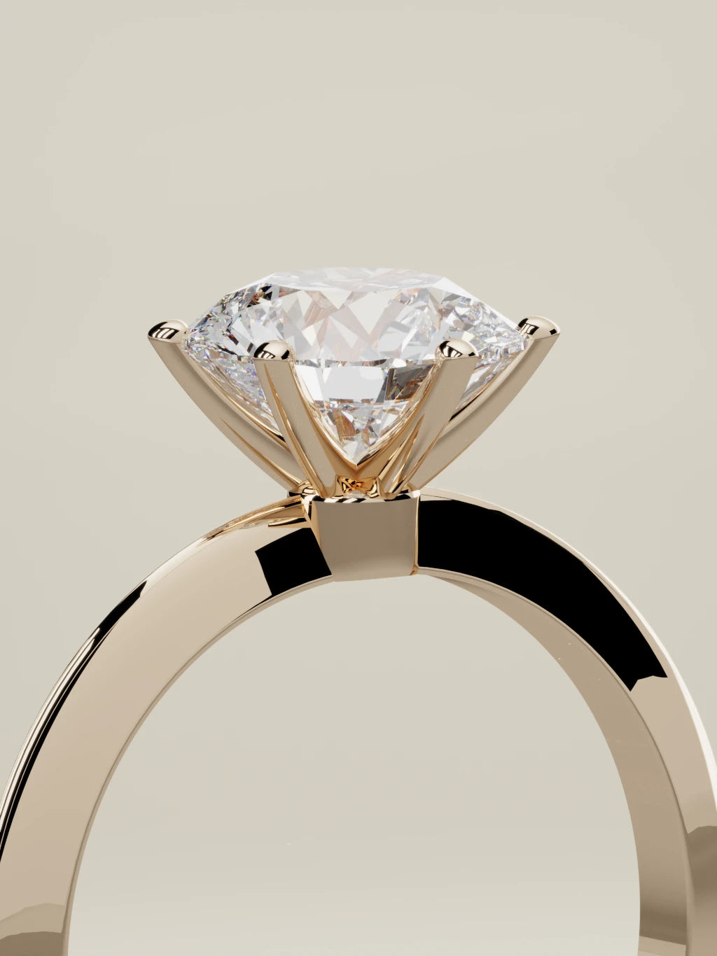 The Prisma round lab-grown diamond solitaire in 14K rose gold, standing three-quarter view