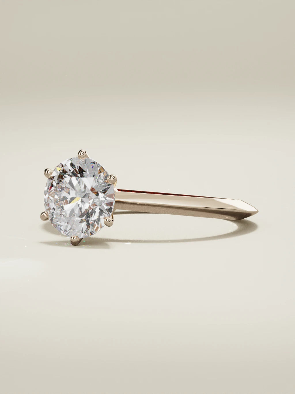 The Prisma round lab-grown diamond solitaire in 14K rose gold, three-quarter view