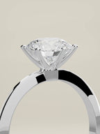 The Prisma round lab-grown diamond solitaire in 14K white gold, standing three-quarter view
