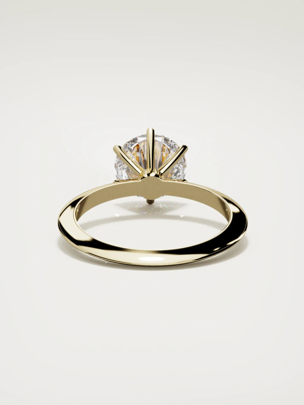 The Prisma round lab-grown diamond solitaire in 14K yellow gold, back view