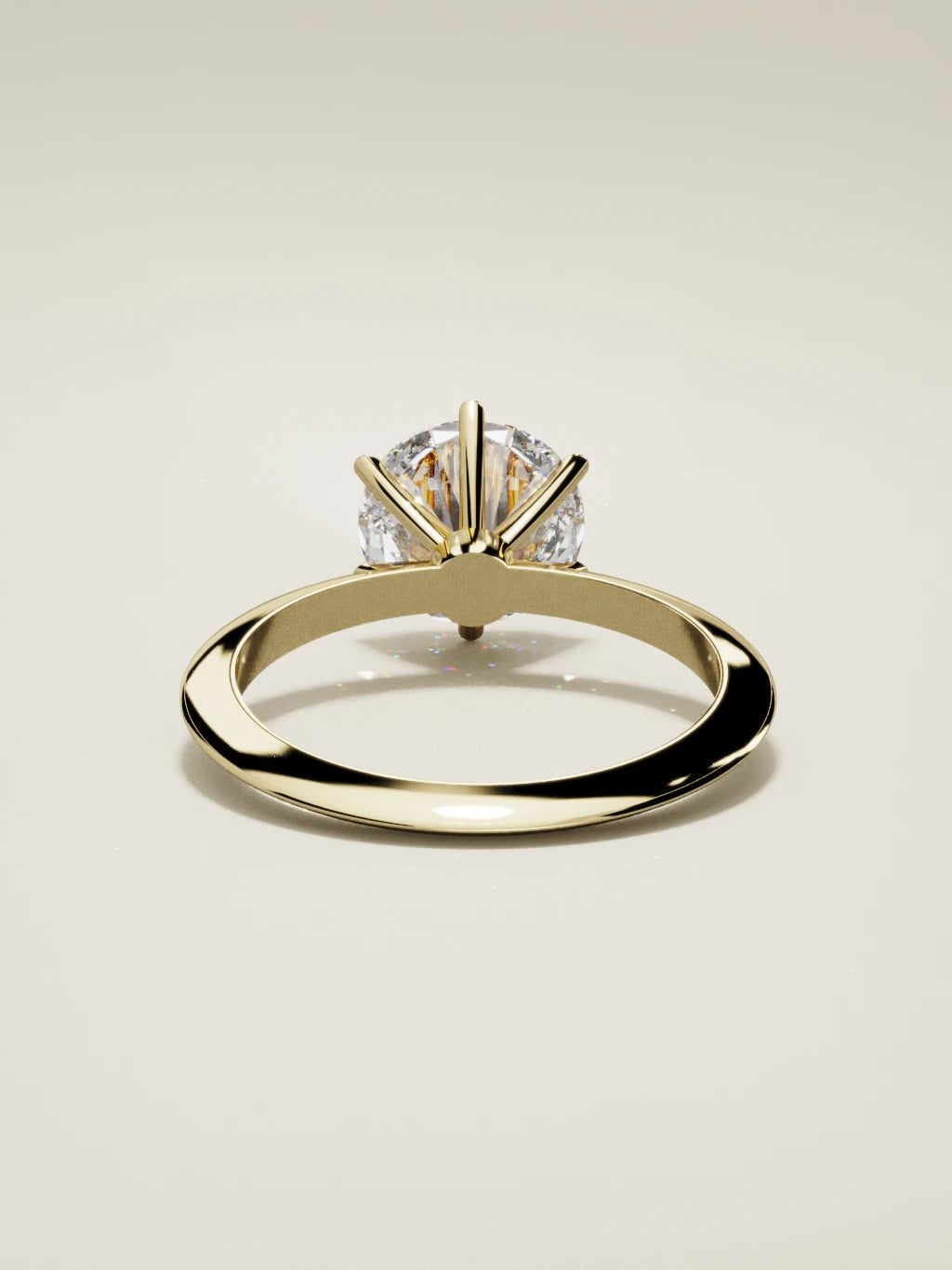 The Prisma round lab-grown diamond solitaire in 14K yellow gold, back view