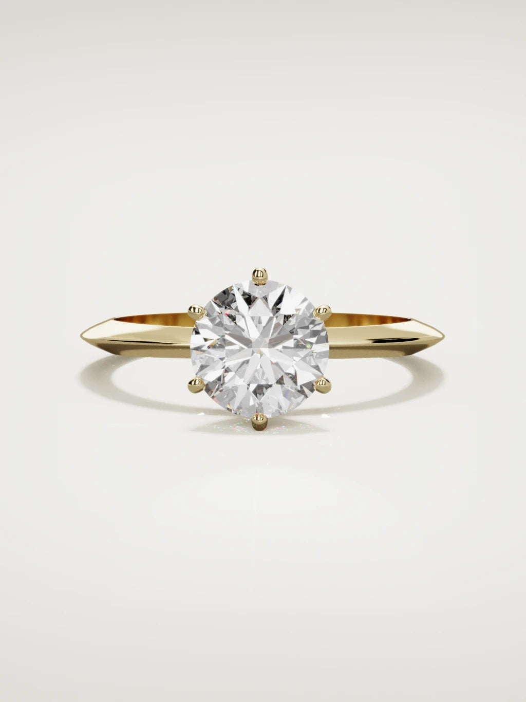 The Prisma round lab-grown diamond solitaire in 14K yellow gold, front view