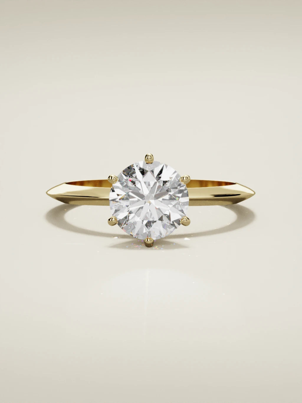 The Prisma round lab-grown diamond solitaire in 14K yellow gold, front view
